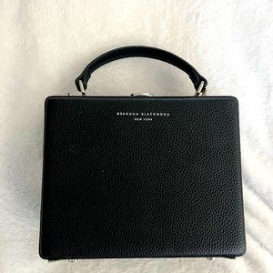 Large Brandon Blackwood Kendrick black trunk.